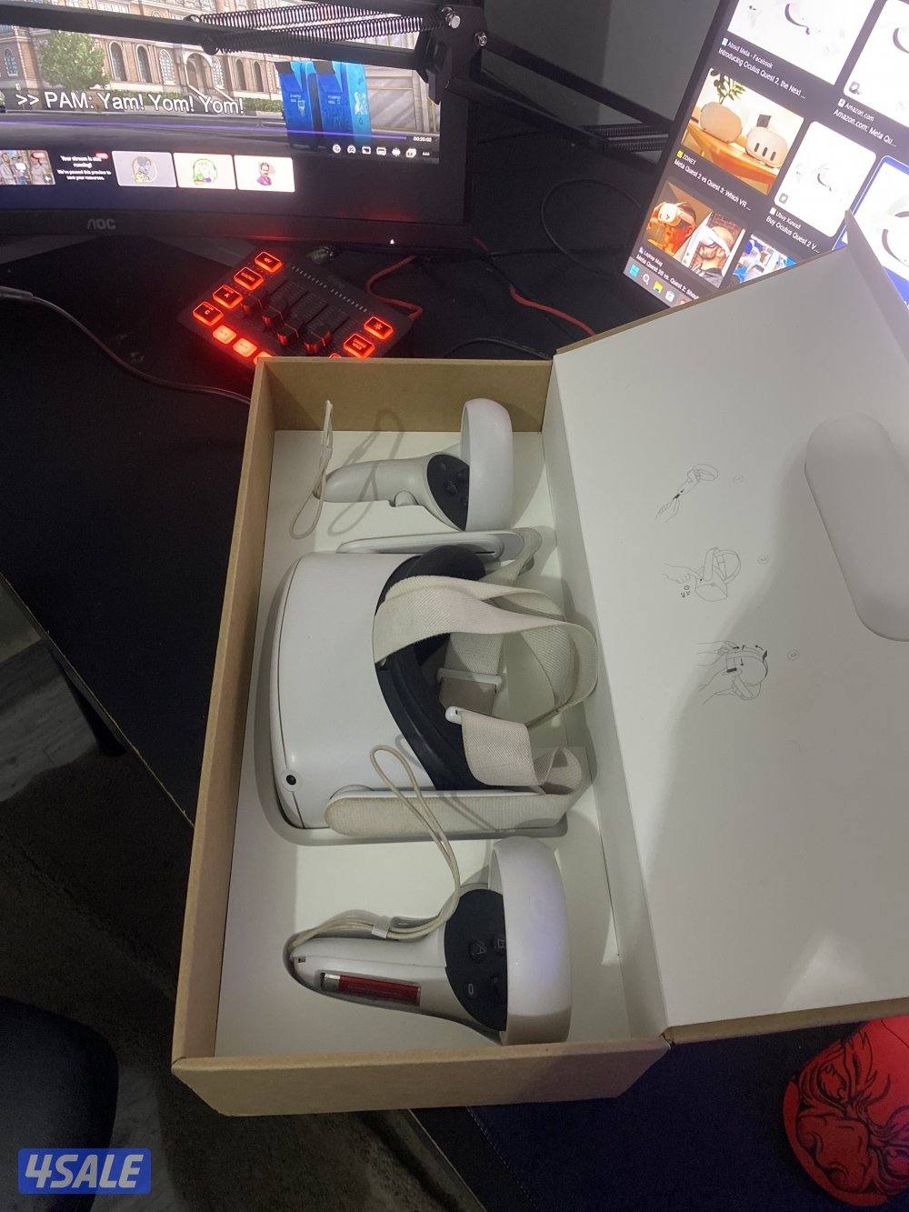 oculus quest 2, في ار كويست تو مع يداتها الاثنين والكرتون.1