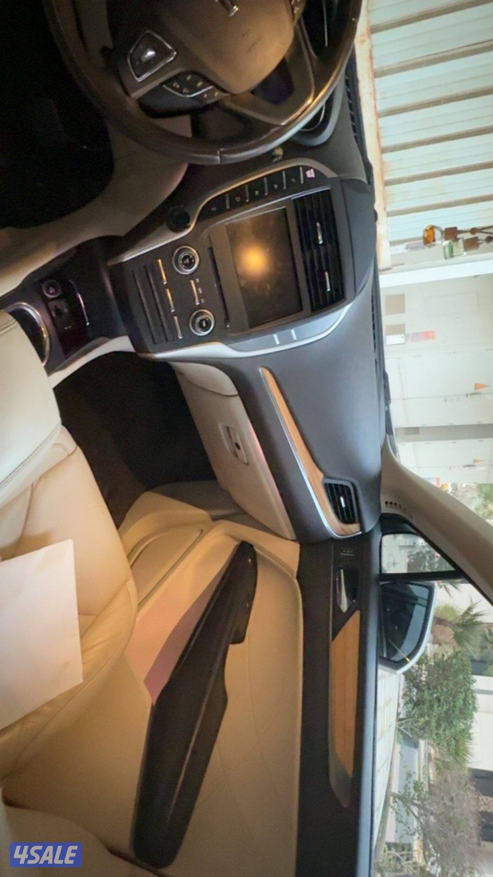 لنكولن MKCموديل 2015 عداد فقط عداد 96 الف لايوجد اصباغ كاملة المواصفات5