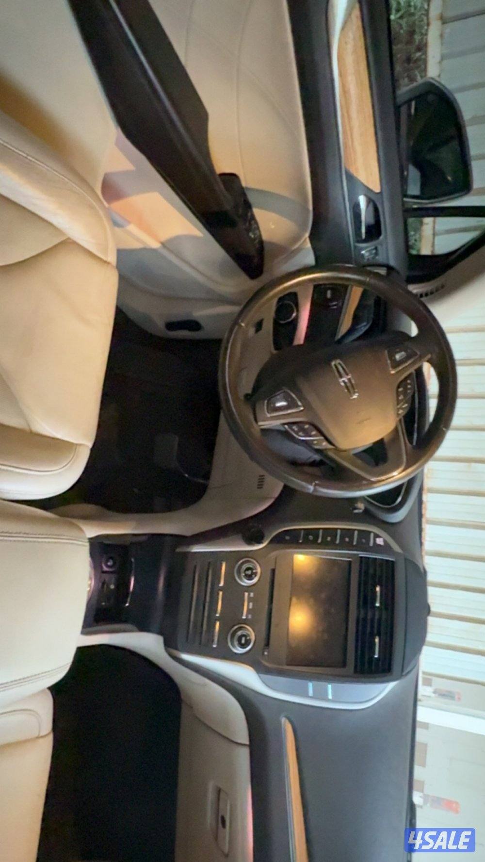 لنكولن MKCموديل 2015 عداد فقط عداد 96 الف لايوجد اصباغ كاملة المواصفات9