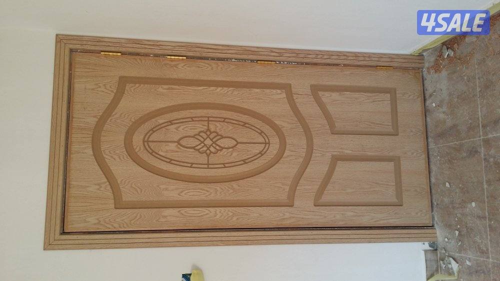 نجار أبواب عازل صوت تلبيس وتنجيد الأبواب للعازل جميع مناطق الكويت12