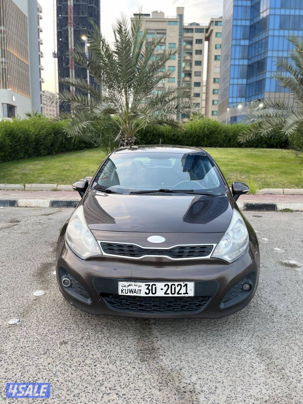 كيا ريو موديل 2014 كامل الموصفات صبغ وكالة عداد 102 الف شرط الفحص2