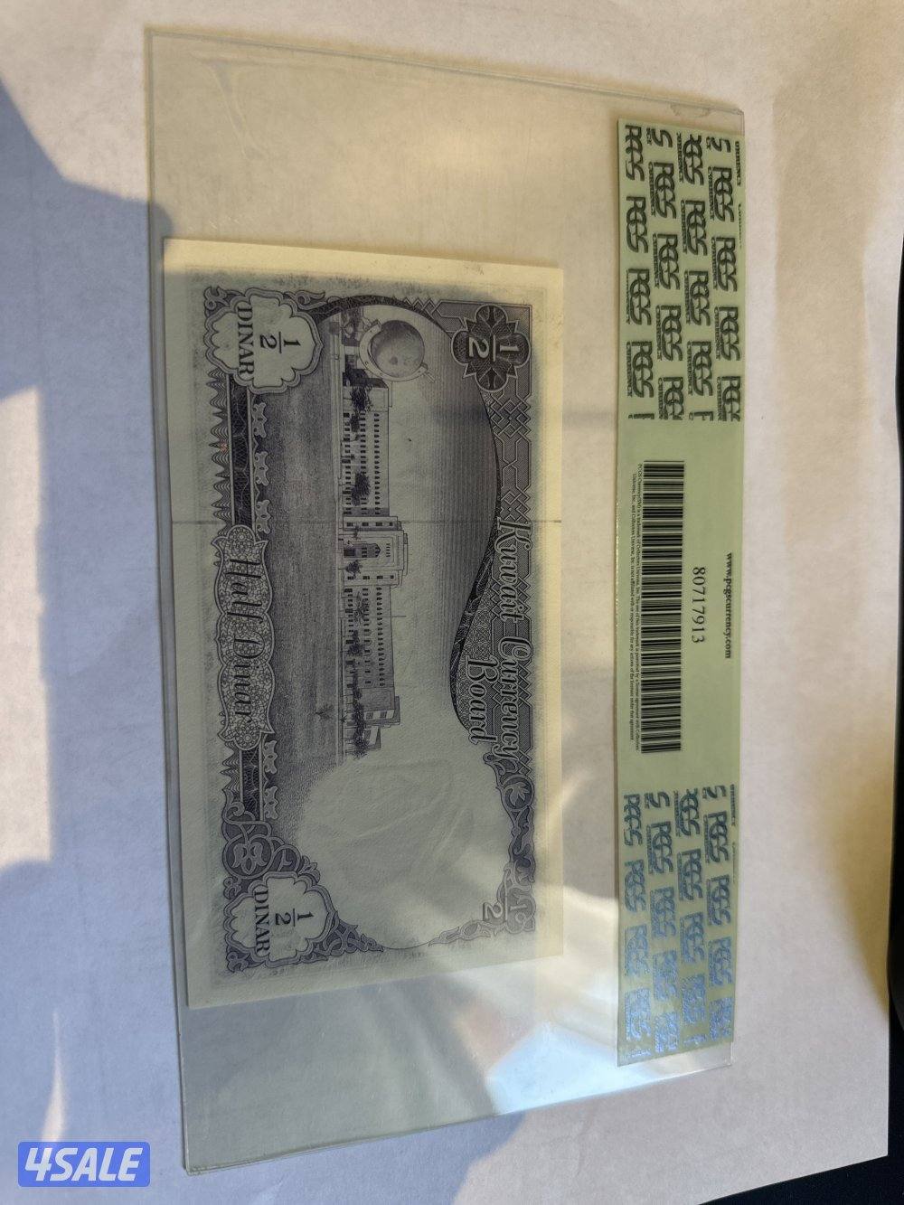 عملة ١/٢ دينار سنة ١٩٦٠ مع شهادة1