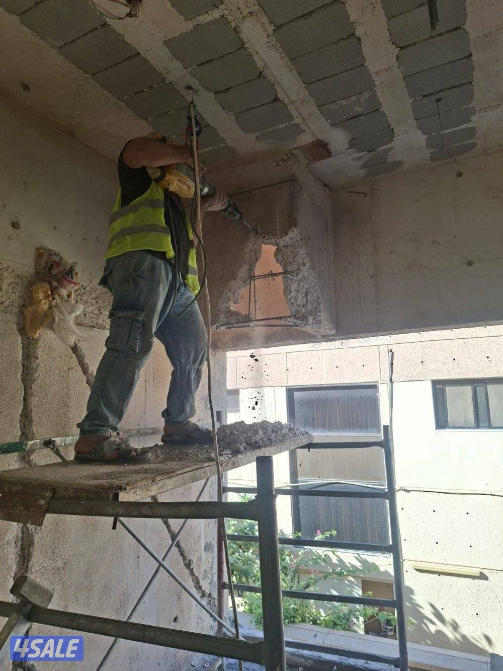 قص خرسانهليزر المسلحة وعمل فتحات الكور للتهويه والصحي وهدم الطوف11