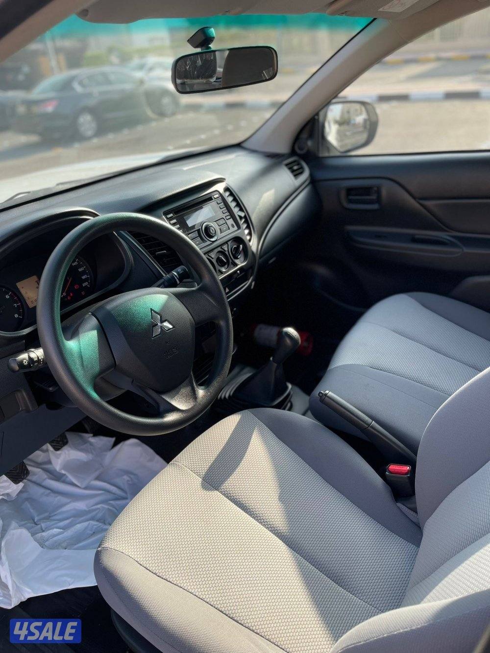 وانيت ميتسوبيشي L200 قير عادي موديل 2022 ماشي 16 الف صبغ الوكالة3