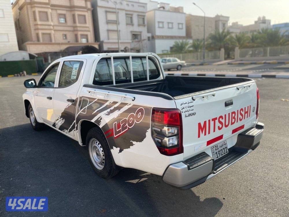 وانيت ميتسوبيشي L200 قير عادي موديل 2022 ماشي 16 الف صبغ الوكالة2