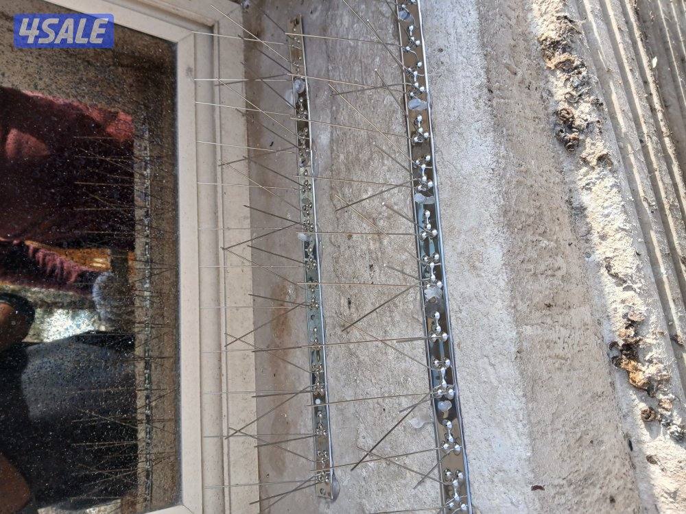 تركيب شبك طارد للطيور للتخلص من فضلات الحمام2