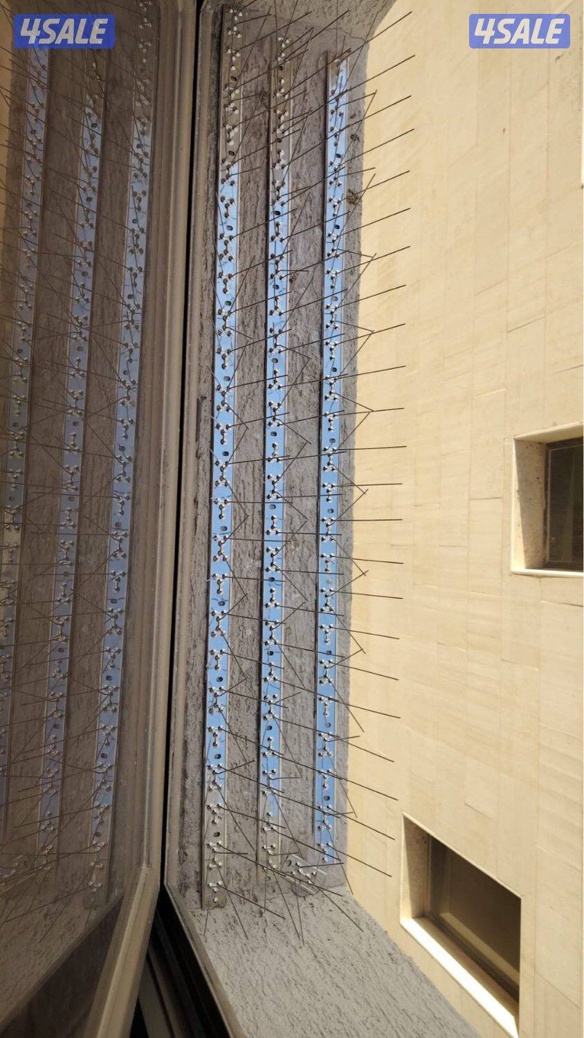 تركيب شبك طارد للطيور للتخلص من فضلات الحمام4