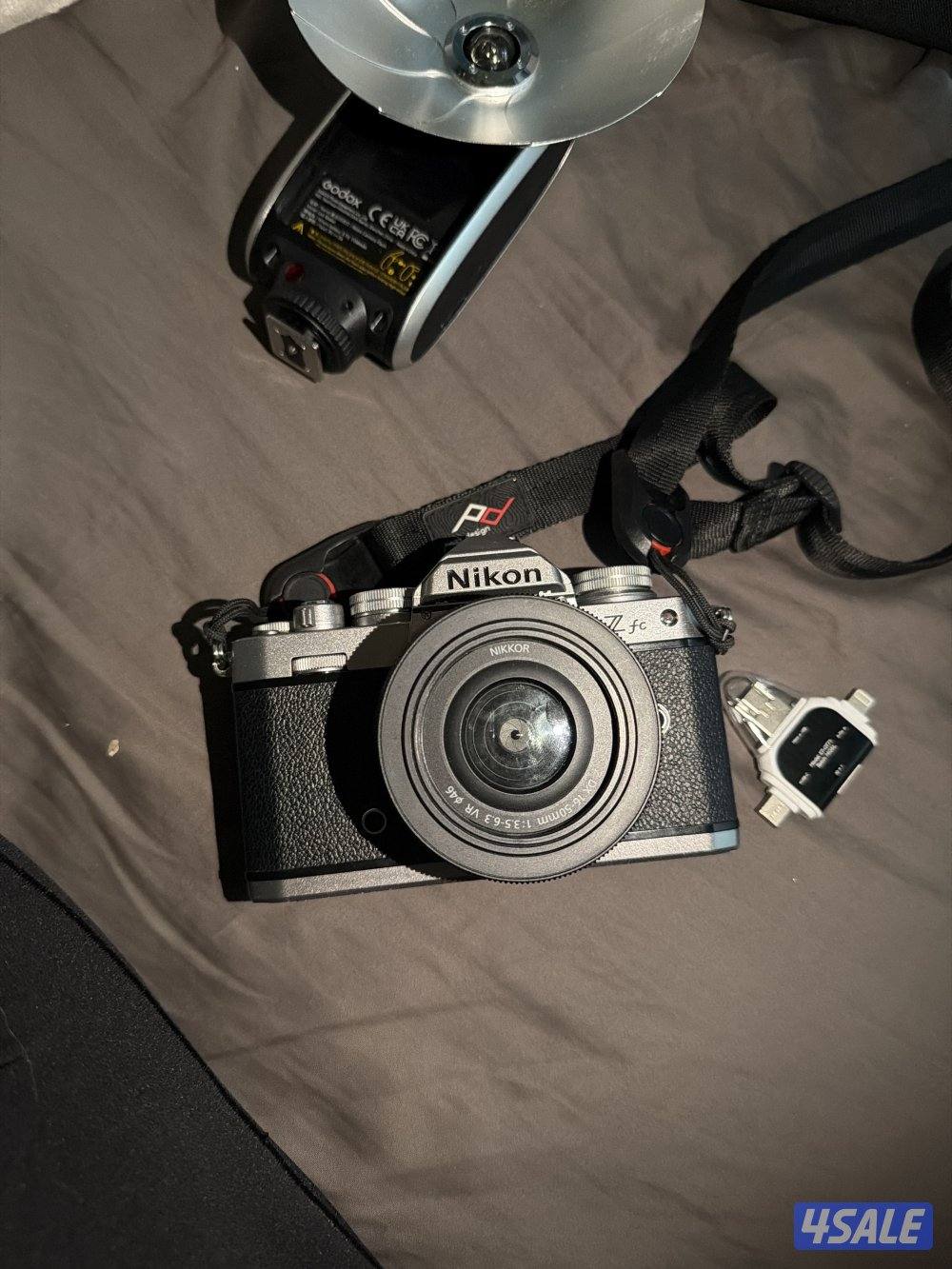 NIKON Z Fc كاميره نيكون مع مرفقات فلاش godox حقيبه0