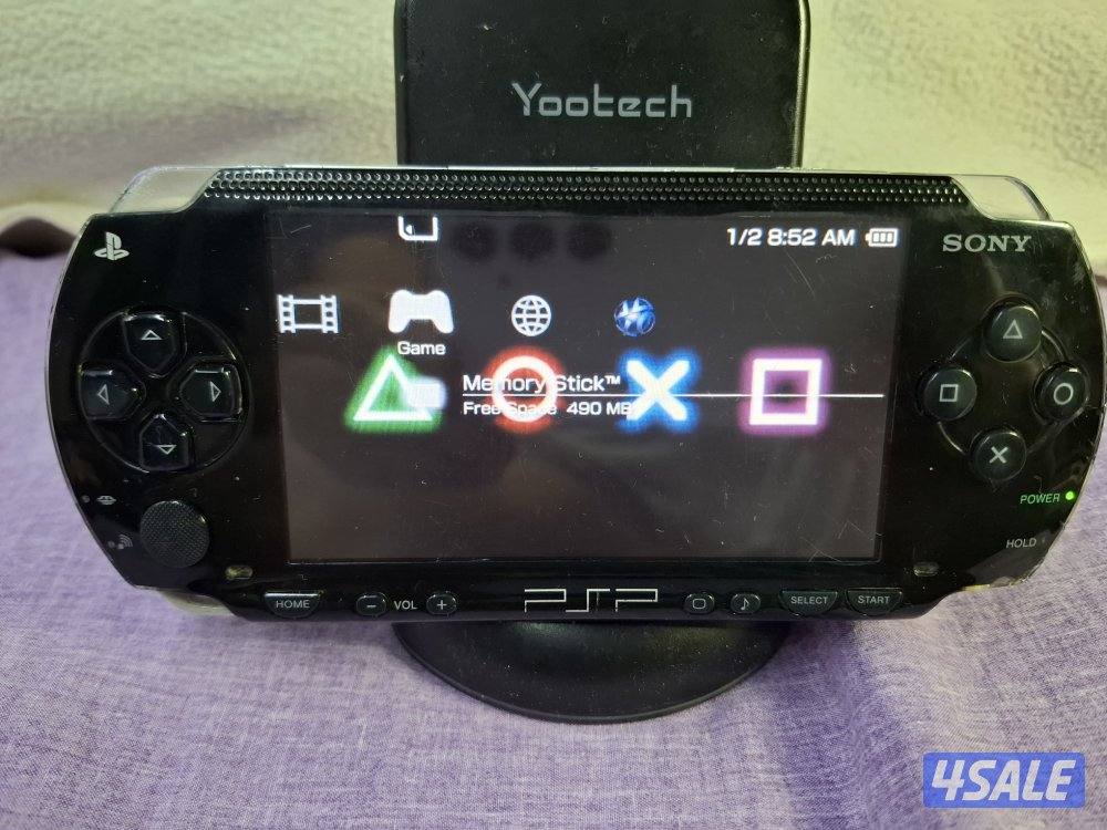 PSP SONY P1000 MODEL.BLACK COLOR 4GB SD CARD WITH 35 GAMES0