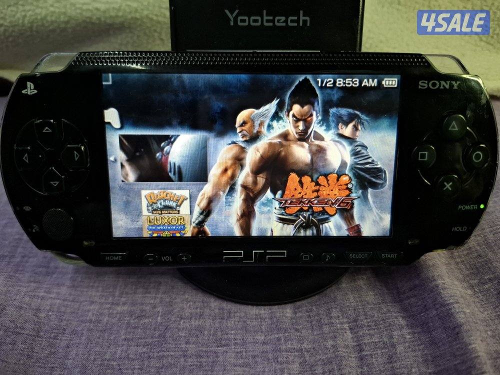 PSP SONY P1000 MODEL.BLACK COLOR 4GB SD CARD WITH 35 GAMES3
