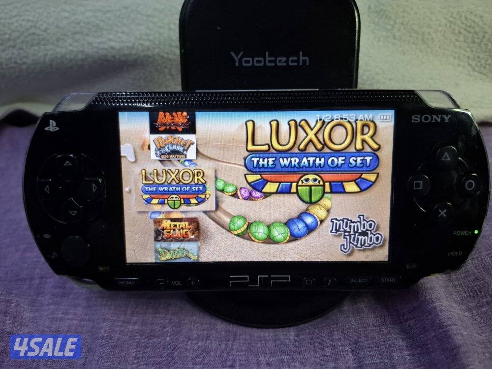 PSP SONY P1000 MODEL.BLACK COLOR 4GB SD CARD WITH 35 GAMES4