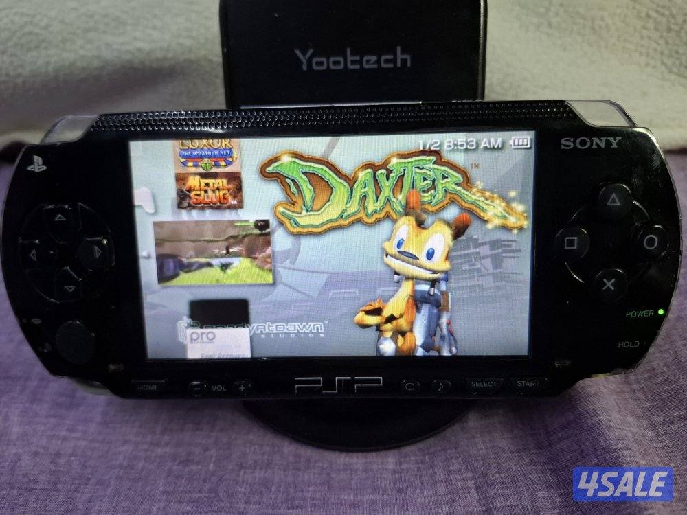 PSP SONY P1000 MODEL.BLACK COLOR 4GB SD CARD WITH 35 GAMES6