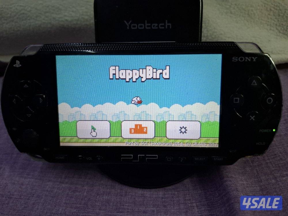 PSP SONY P1000 MODEL.BLACK COLOR 4GB SD CARD WITH 35 GAMES7