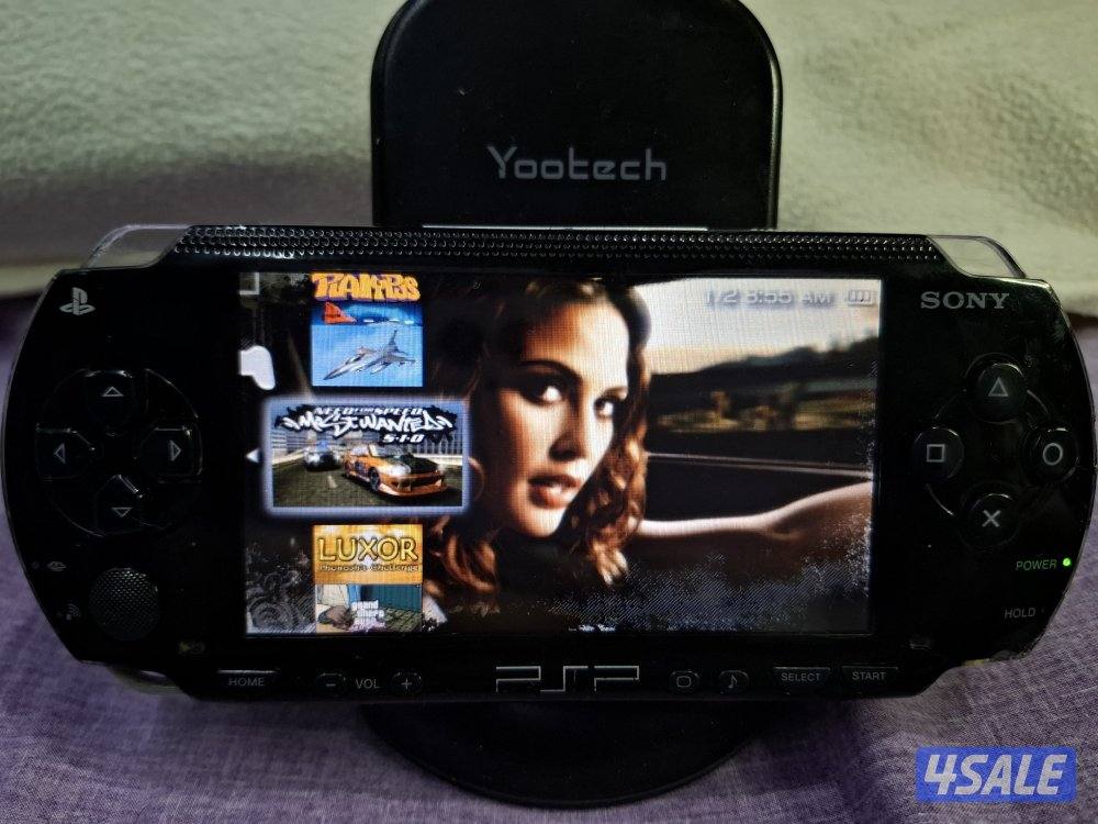 PSP SONY P1000 MODEL.BLACK COLOR 4GB SD CARD WITH 35 GAMES9