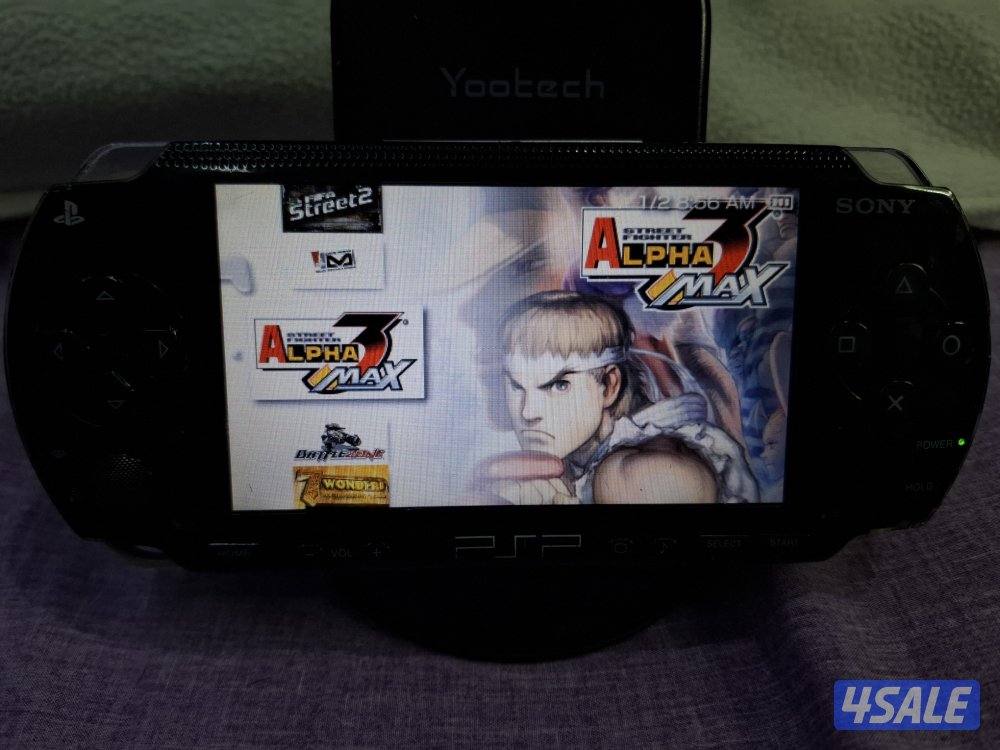 PSP SONY P1000 MODEL.BLACK COLOR 4GB SD CARD WITH 35 GAMES11