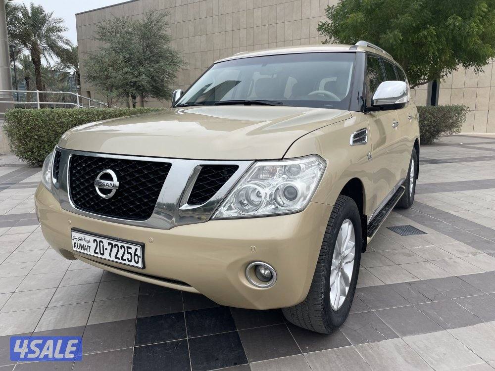 للبيع باترول 2013 ذهبي SE كامل المواصفات0