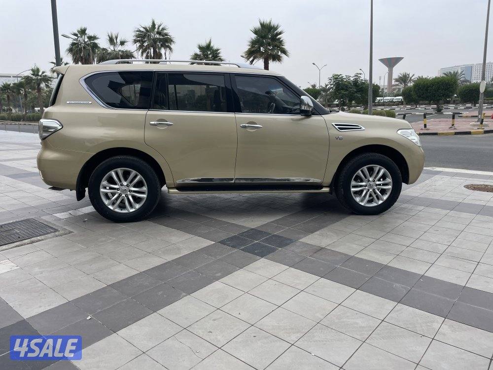 للبيع باترول 2013 ذهبي SE كامل المواصفات5