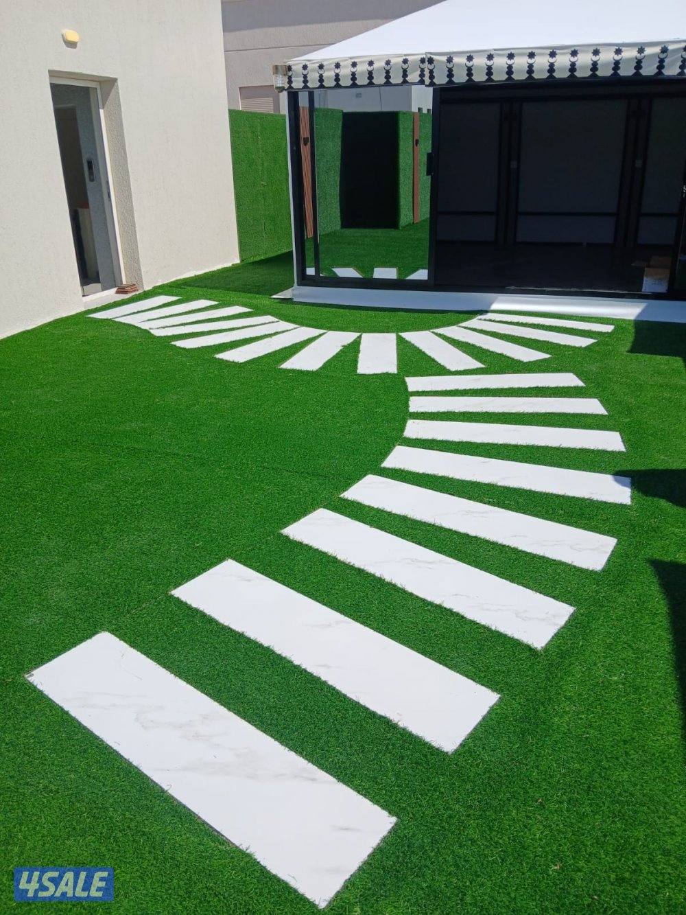 تنسيق الحدائق وتركيب السور التركي وتركيب الثيل الصناعي0