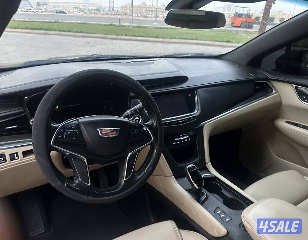 كاديلاك XT5  2018 شرط جير مكينه شاصي 188 ميل اربعه تربو5