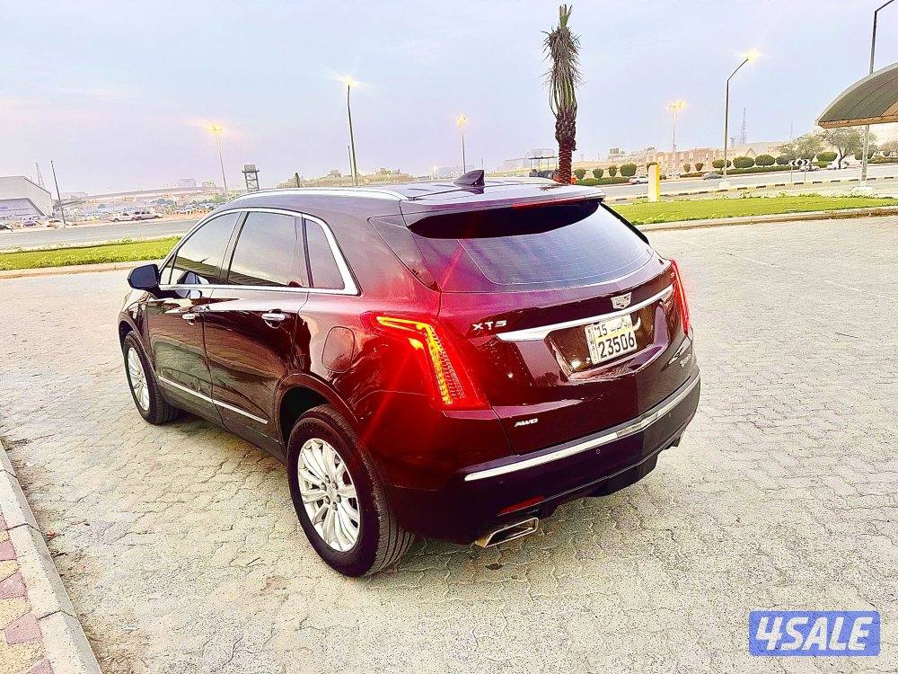 كاديلاك XT5  2018 شرط جير مكينه شاصي 188 ميل اربعه تربو9