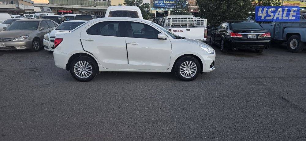 دزاير سوزوكي ٢٠٢٢ ابيض ماشي ٦٣ الف نظيفه3