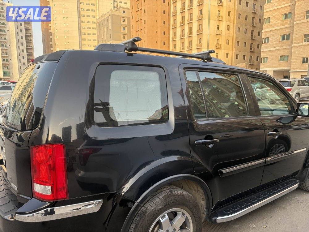 Honda pilot 2014 excellent condition 3.6 liter 6 cylinder4