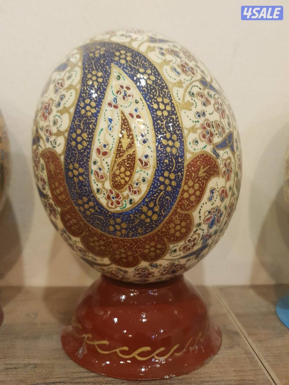 بيض نعام منقوش و مخطوط يدويا8