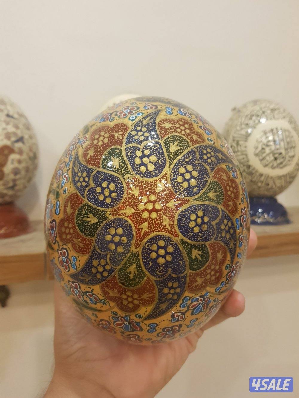 بيض نعام منقوش و مخطوط يدويا9