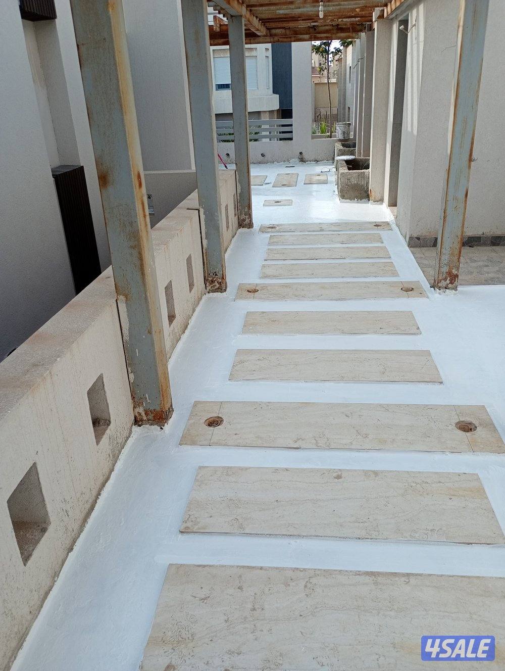 نقوم بعمل عازل الاسطح للقسايم والمجمعات  بجميع مناطق الكويت1