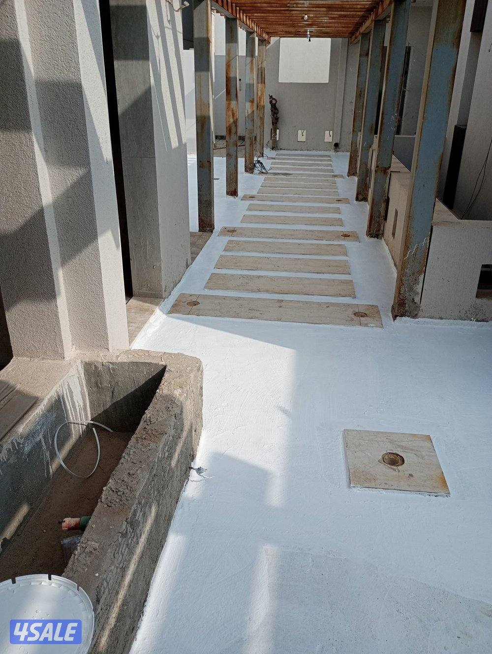 نقوم بعمل عازل الاسطح للقسايم والمجمعات  بجميع مناطق الكويت2