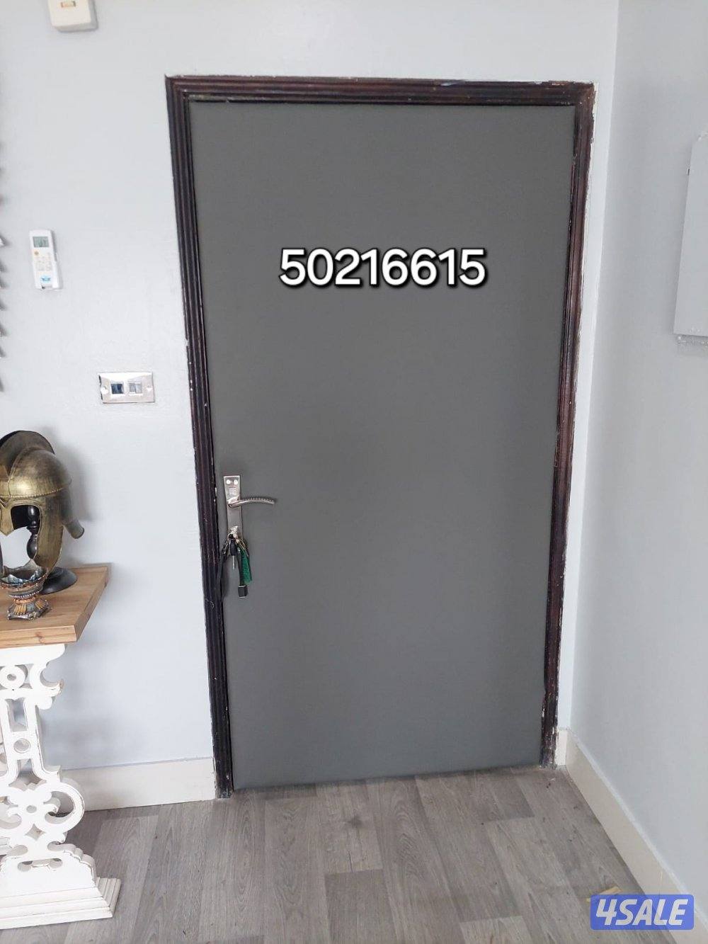 نجار أبواب عازل صوت تلبيس وتنجيد الأبواب للعازل1