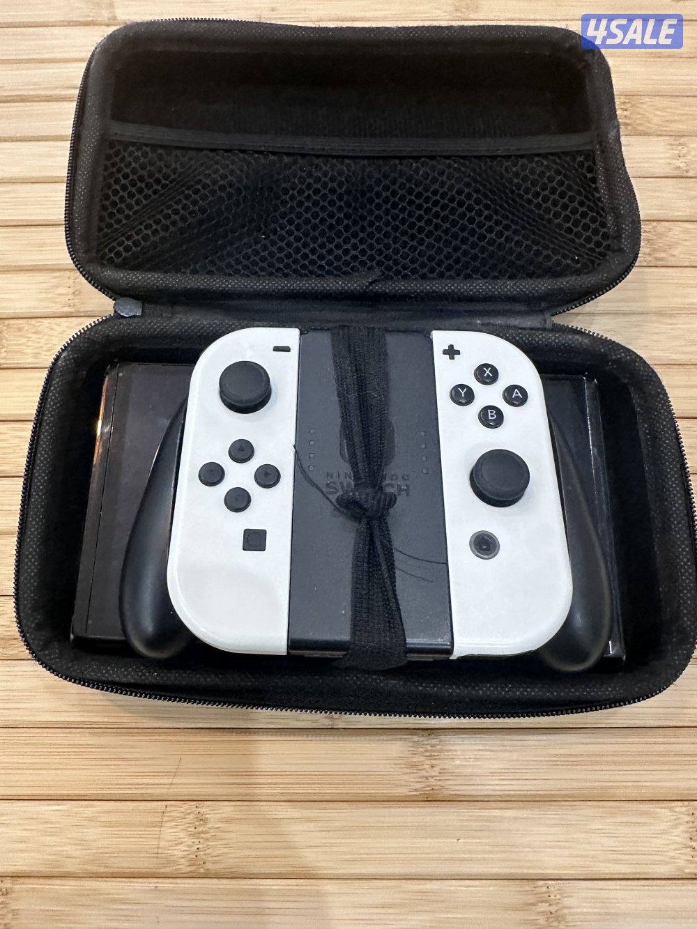 نيتيندو سويتش 1 الاولد مع لعبه ماريو نظيفة مع كامل أغراضها وجنطه حماية0