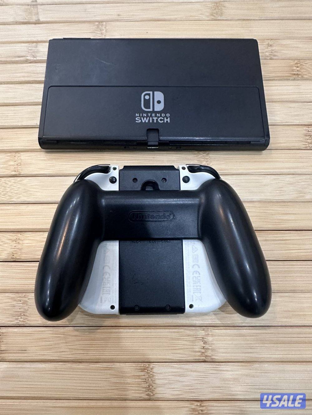 نيتيندو سويتش 1 الاولد مع لعبه ماريو نظيفة مع كامل أغراضها وجنطه حماية2