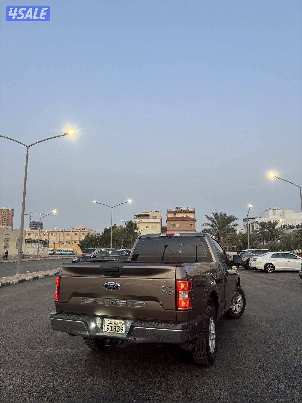 فورد F-150 غمارة عداد 128الف بحالة ممتازه2