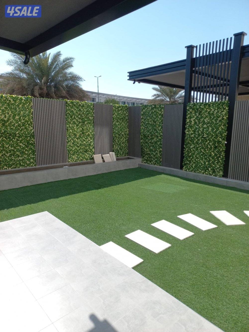 تنسيق حدائق تركيب ثيل صناعي وطبيعي وسور للحديقه تركيب بديل الخشب13