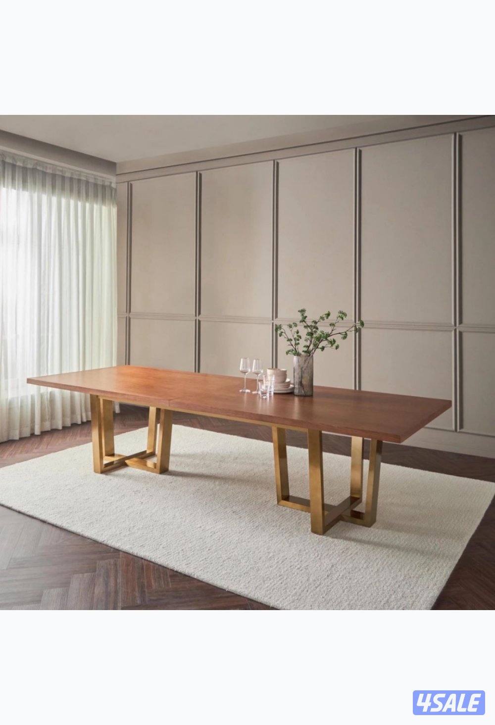 طاولة طعام من هوم سنتر مع ١٢ كرسي من بسمة هوم0