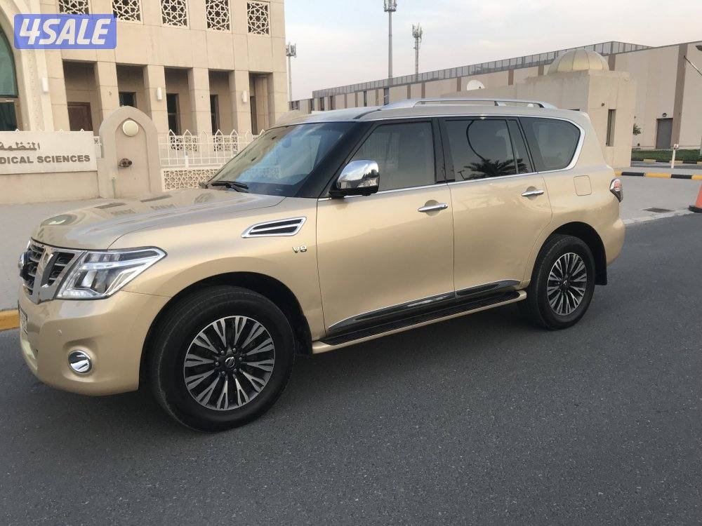 جيب نيسان باترول بلاتنيوم مديل  2014  لون ذهبي3