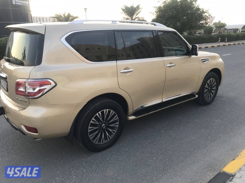 جيب نيسان باترول بلاتنيوم مديل  2014  لون ذهبي7