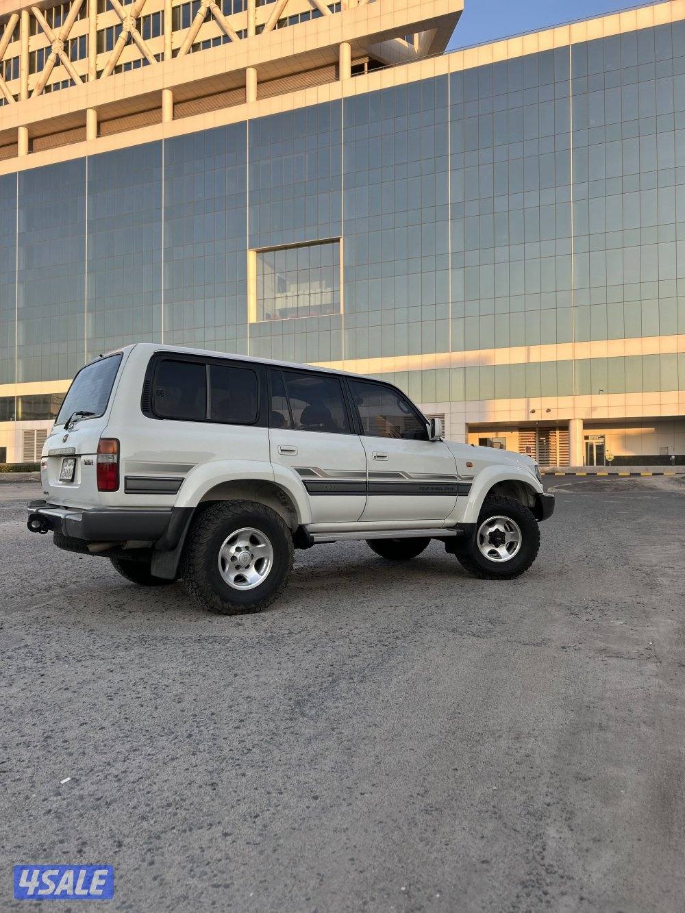 لاند كروزر vxr 1997 قير عادي وارد قطر 228km ابيض6