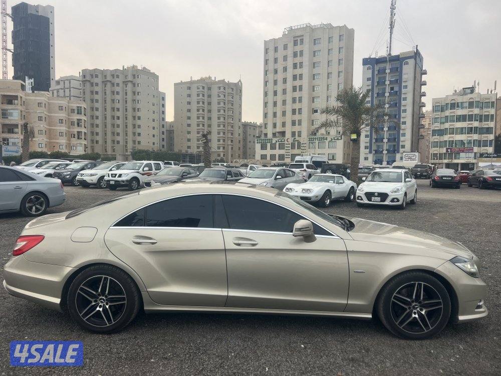 مرسيدس CLS500 ذهبي موديل 2012 بحاله ممتازه وفحص جير مكينه شاصي كامله1