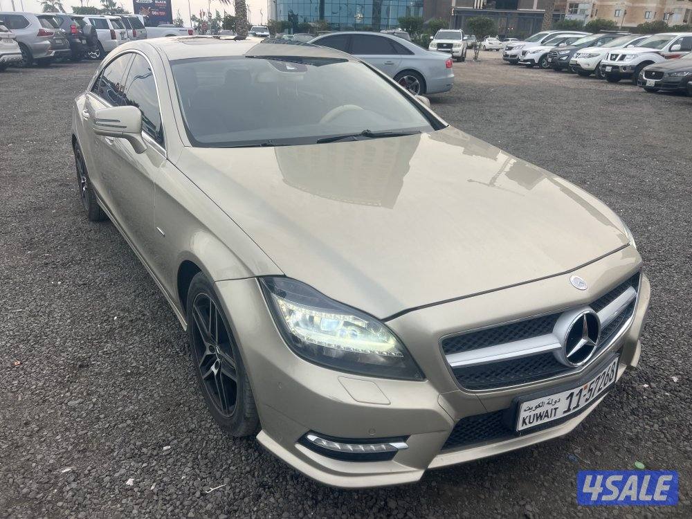 مرسيدس CLS500 ذهبي موديل 2012 بحاله ممتازه وفحص جير مكينه شاصي كامله0