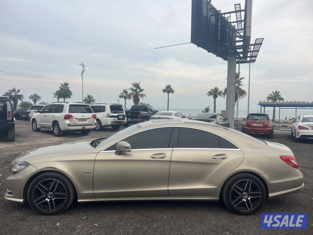 مرسيدس CLS500 ذهبي موديل 2012 بحاله ممتازه وفحص جير مكينه شاصي كامله3