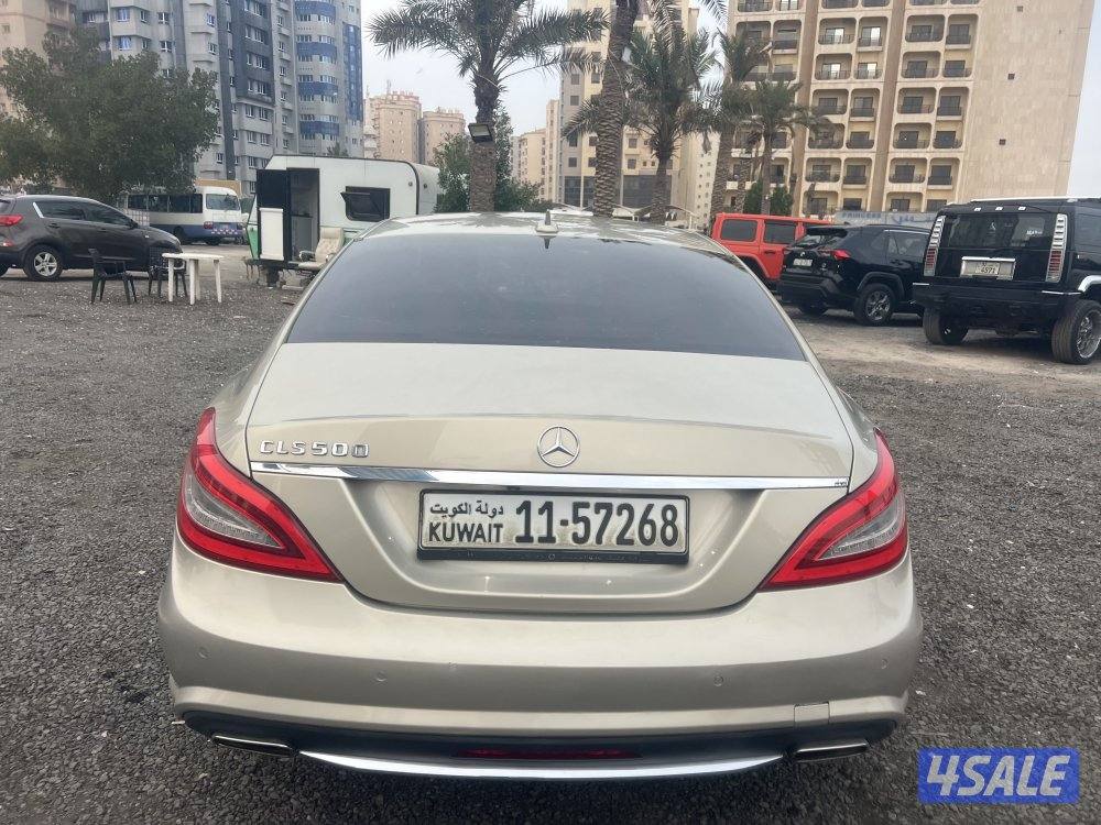 مرسيدس CLS500 ذهبي موديل 2012 بحاله ممتازه وفحص جير مكينه شاصي كامله9