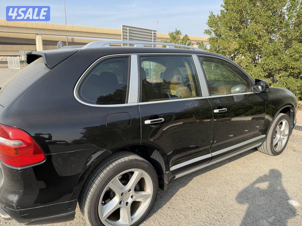 بورش كايين2009 لون اسود صبغ وكاله0