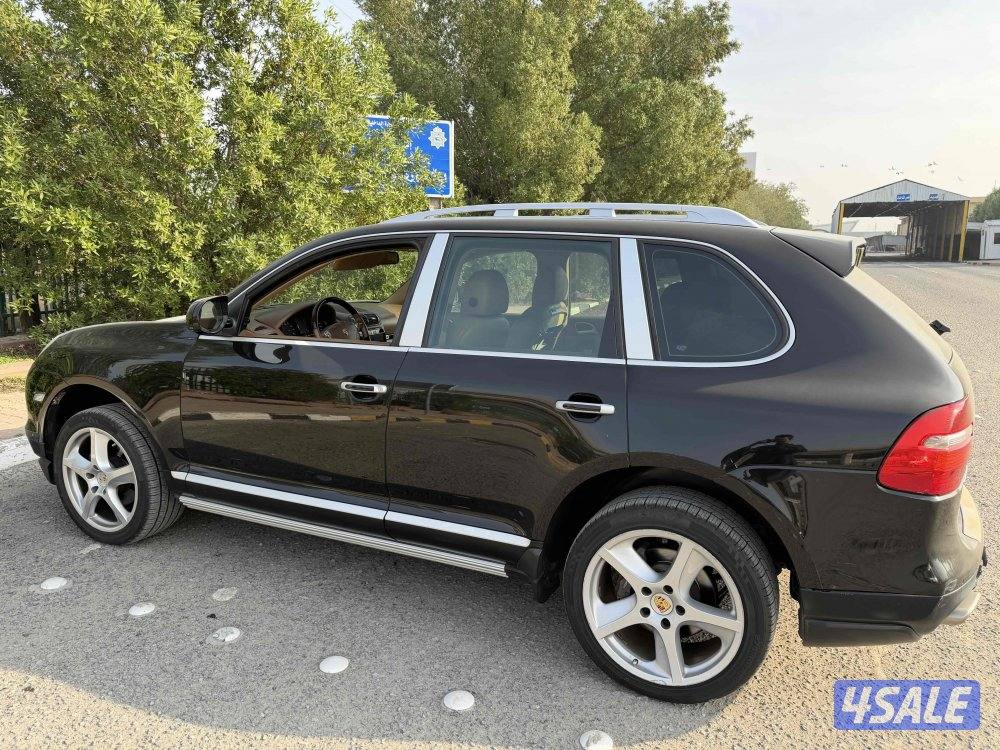 بورش كايين2009 لون اسود صبغ وكاله1