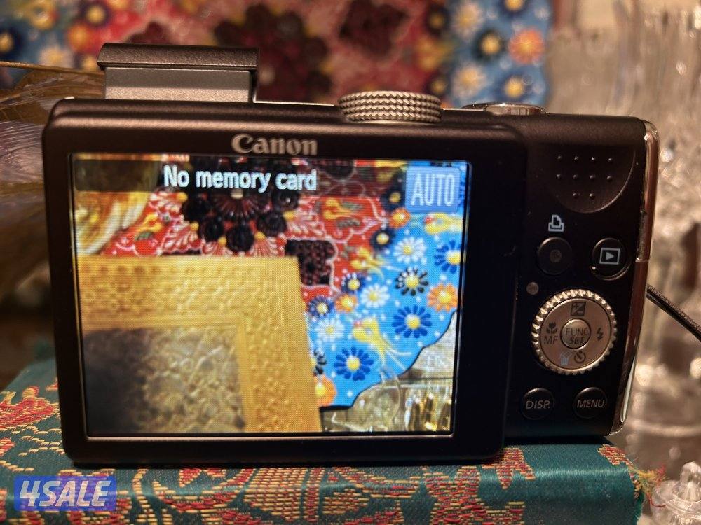 كاميرا كانون نفس جديده  مع كامل اغراضها1