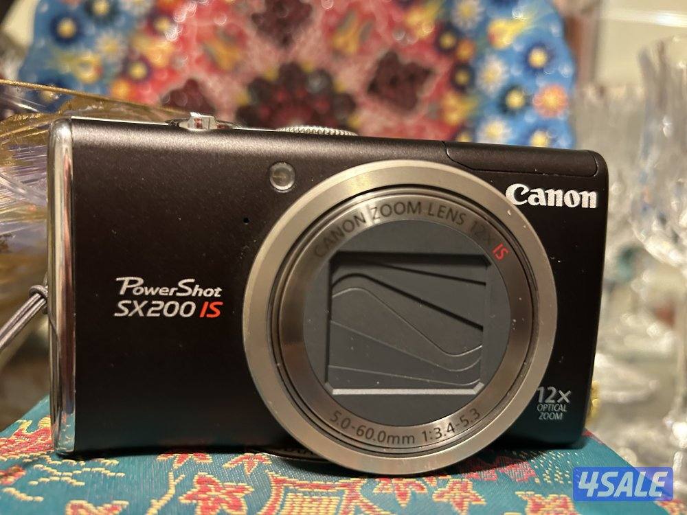 كاميرا كانون نفس جديده  مع كامل اغراضها3