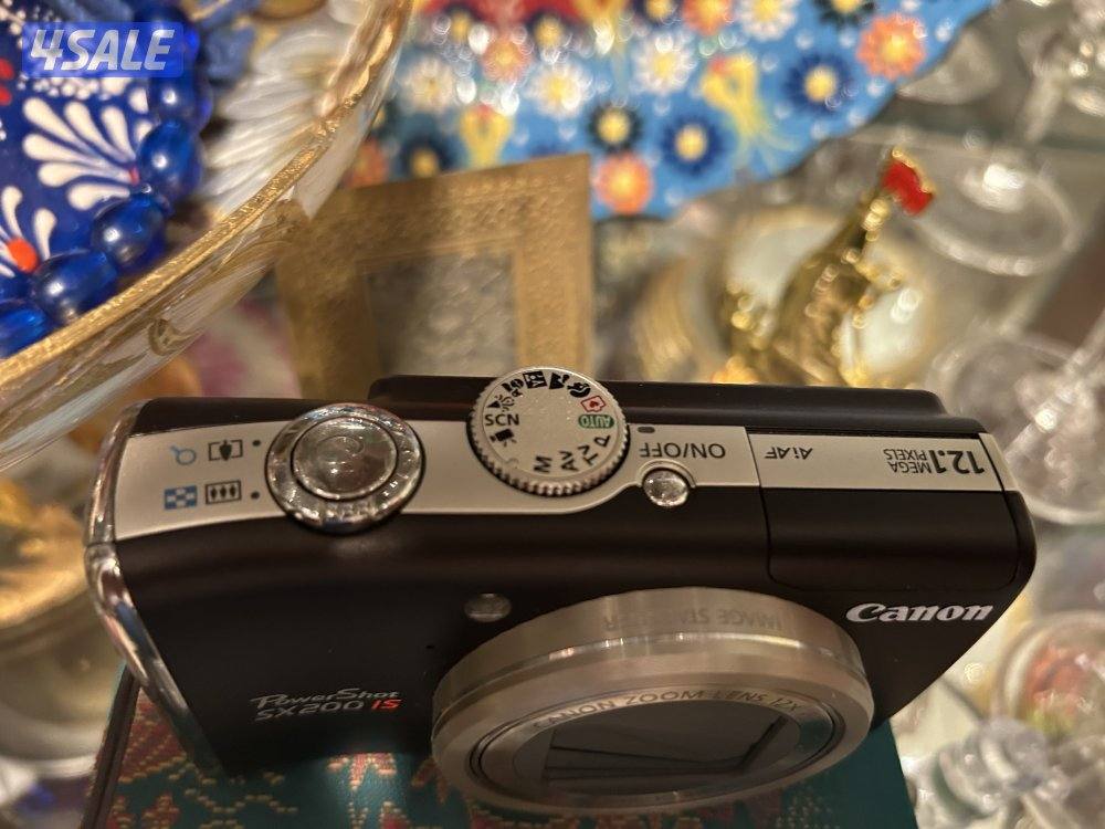 كاميرا كانون نفس جديده  مع كامل اغراضها4