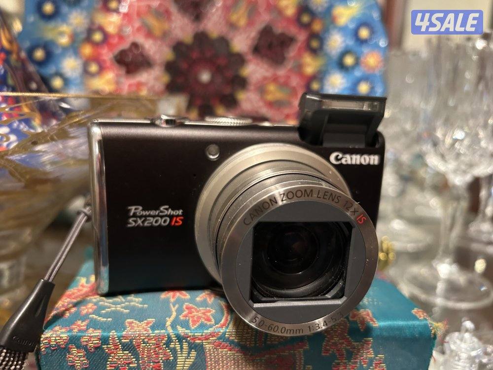 كاميرا كانون نفس جديده  مع كامل اغراضها5