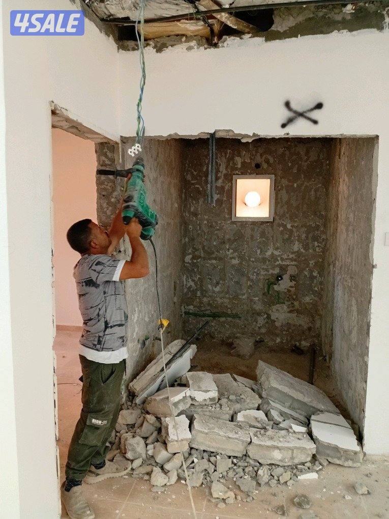 بناء  مساح  سيجما تكسير ابواب واطواف وعوازل جيتاروف وترميمات صبغ خارج0